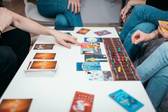05.11.2024 Krakow, Poland Group of friends playing a dixit game at home