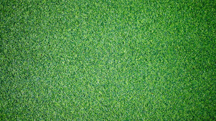 Fototapeta premium Artificial grass texture background with dark green gradient. for backdrop banner autumn scene