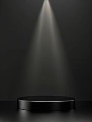 black podium for product presentation shining down with spotlight