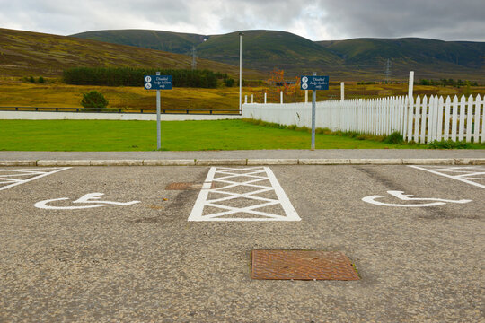 Two disabled parking spaces in a car park, horizontal landscape format