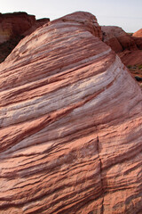 Close up on a section of the striped Fire Wave rock strata which forms pink patterned waves in the...