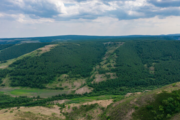 Fototapeta premium Aerial photography of the windmills on the Wuxian grassland along the North Xinjiang Scenic Avenue in Keshiketeng Banner, Chifeng City