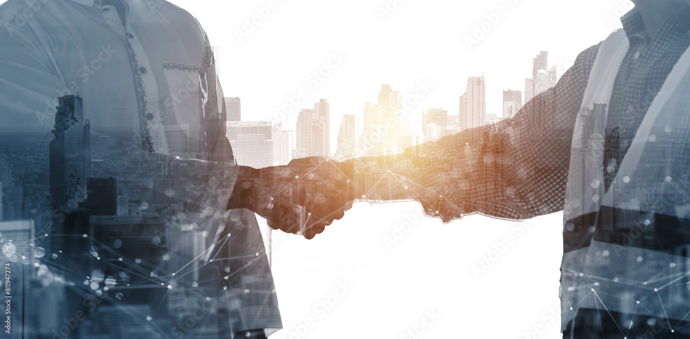 Wall mural engineering worker industry double exposure city teamwork concept, handshake uniting working as a te