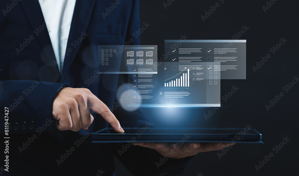 Poster businessman using a tablet to analyze company's financial revenue and profit with value increasing c