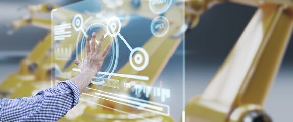 Engineer monitoring robotic AI arms in manufacturing factory plant, manager managing controlling using computer holographic ui display analysis innovation technology, male engineer, banner background.