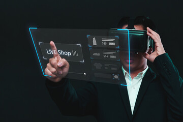 Businessman using VR Live shop ecommerce store concept, sales marketing selling products online on streaming platform, sales business person strategy using virtual reality headset with graphic icon.