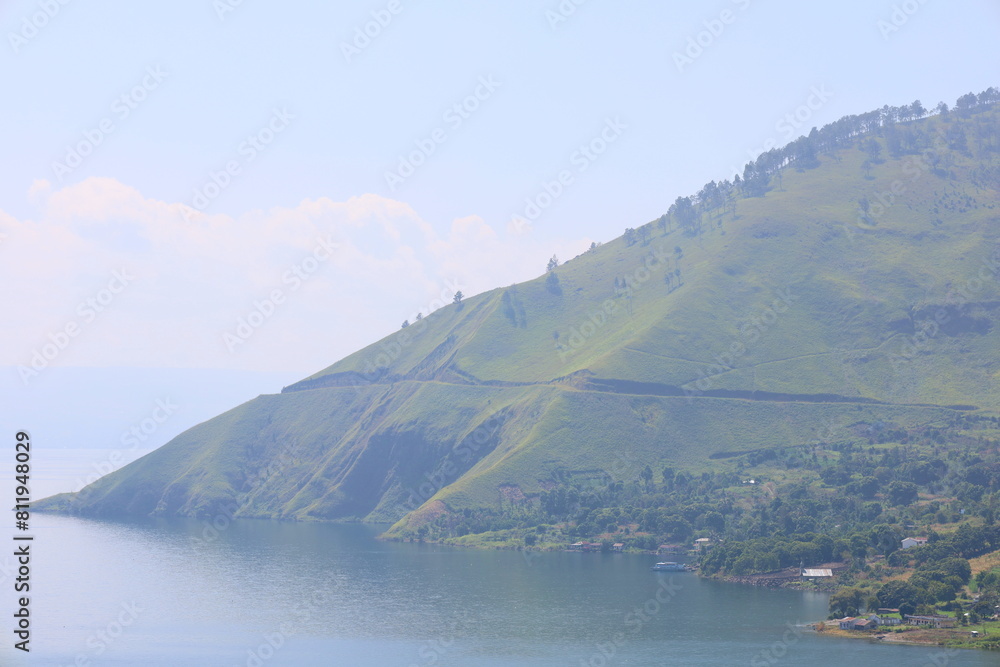 Wall mural stunning scenery of volcanic lake toba - largest and deepest crater lake in the world located in nor