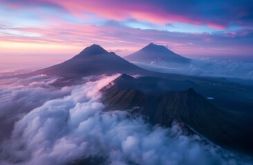 Photograph of two mountain peaks emerging from the clouds 