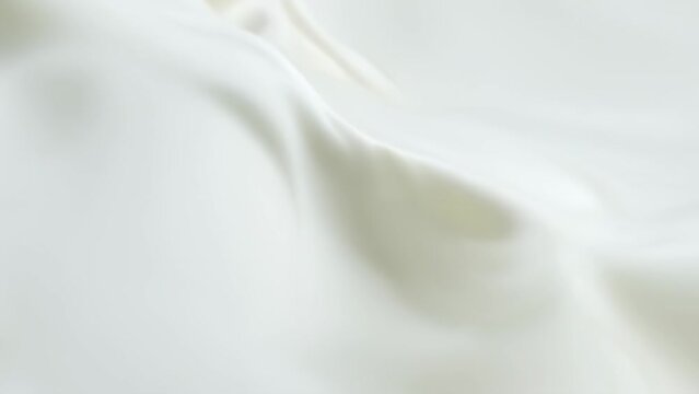 Сreamy white cosmetic product texture with smooth and silky peaks, ideal for beauty and skincare advertising