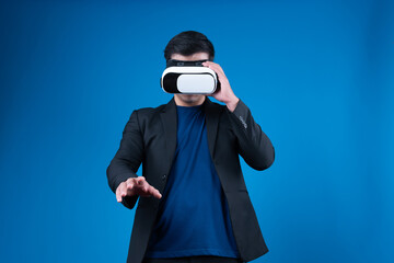 Profile businessman wearing VR headset looking to connect metaverse searching by touching slide...
