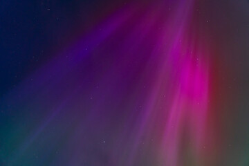 Naklejka premium The Northern Lights in a graveyard on Anglesey Wales