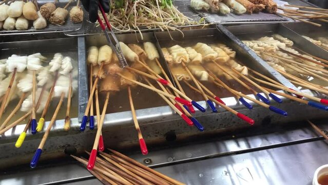 Korean street food stall, Odeng (fish-cake skewers), tteokbokki and other fried food.