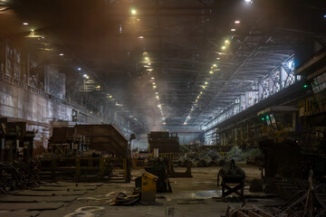 Industrial interior of a metallurgical plant at night, Russia