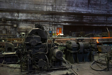 Metalworking in a metallurgical plant, closeup of photo