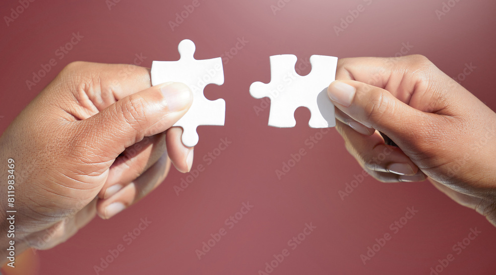 Poster Hands, puzzle and jigsaw for people in studio for connection, teamwork and link by red background. Colleagues, game and toys for synergy, collaboration and strategy with problem solving in office
