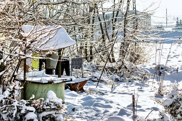 A well in the village in winter.