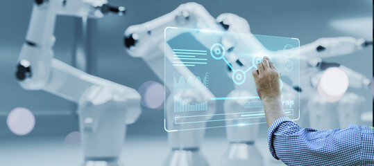 Engineer monitoring robotic AI arms in manufacturing factory plant, manager managing controlling using computer holographic ui display analysis innovation technology, male engineer, banner background.