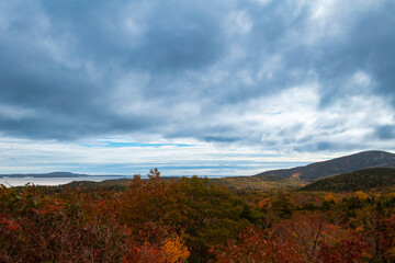 Scenic view of the hills with trees with the Autumn colors foliage in the State of Maine, USA.