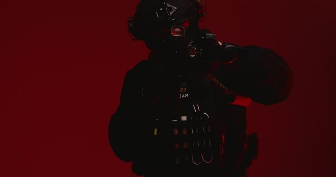 A special forces operative aiming an AR-15 rifle, depicted in a male portrait against a red background with flashes around.