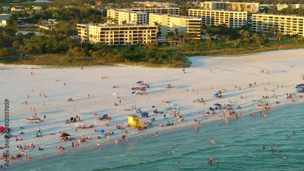 Canvas Prints Siesta Key beach in Sarasota, USA. Many people enjoying vacation time swimming in gulf water and relaxing on warm Florida sun at sunset