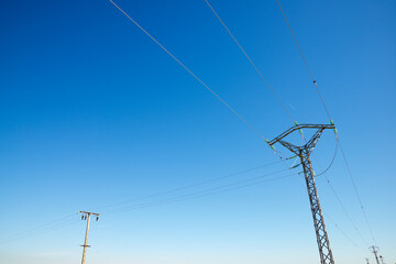 Power line and blue sky