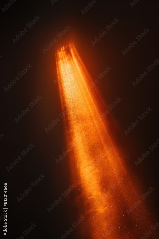 Poster A striking image of a bright light shining through the dark sky. Perfect for various design projects