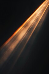 A stunning image of a bright beam of light shining through the dark sky. Perfect for various design projects