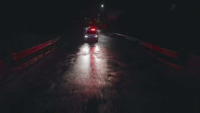 Traffic Patrol Car in Pursuit. Police Officers in Squad Car Chasing Suspect on  Road, Sirens Blazing, High Speed. Cops on Emergency Response Call. Stylish Cinematic Action Packed Shot