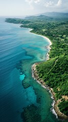 A winding coastline from above, showcasing the contrast between lush green jungle, pristine beaches
