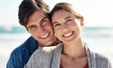 Love, couple and portrait on beach or vacation for honeymoon with ocean, waves and sunshine....
