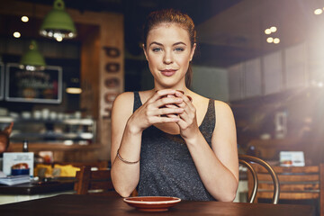 Woman, coffee shop and calm portrait with latte and happy customer with smile and table. Cup,...