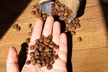 coffee beans in hands