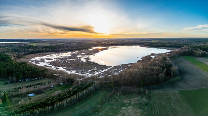 Sunset over the lake. View from the drone.