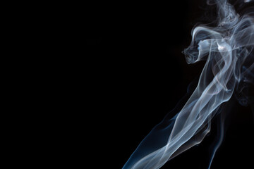 Obraz premium Swirls of smoke on a black