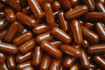 Brown Softgel Capsules. Top View of a Heap of Numerous Vitamin D3 Capsules in Brown Softgel Form