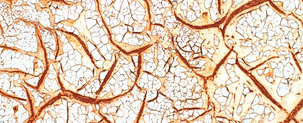 Rusty metal abstract background. Texture of an old grunge metal plate with cracked paint.