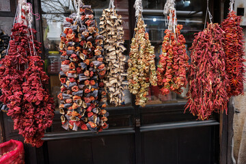 Fototapeta premium View of dried vegetables hanging. Dried eggplant, pepper, bell pepper, zucchini, tomato