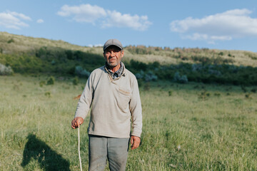 Rural Essence Portrait of Senior Peasant Man Farmer in Outdoor Setting
