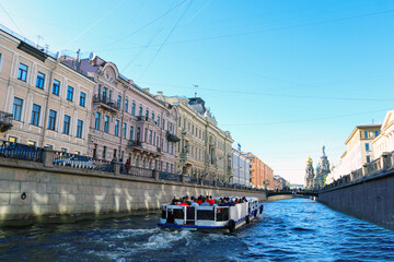 Rivers and canals of St. Petersburg, view from the river to the buildings of the city, the embankment of the river and canals.