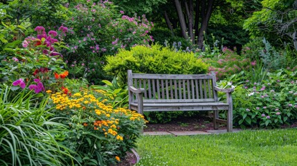 Obraz premium Quaint wooden bench nestled among vibrant flowering bushes in a lush garden, inviting tranquility