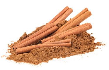 Pile of ground cinnamon and cinnamon sticks isolated on a white background. Spices.