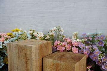 Wooden podium display scene stage showcase front view with copy space and flowers decoration