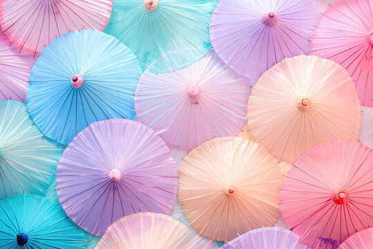 Repeating pattern with colorful pink, orange, yellow, red, and green umbrellas on a blue background