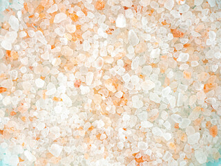 The texture of pink Himalayan salt in large crystals. A place for the text.