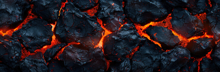 closeup of glowing red coals with fiery details and intense heat