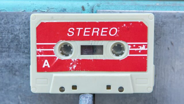 retro cassette tapes against changing urban backgrounds