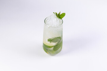 Mahito cocktail in a glass on a light background.