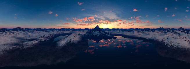 Dramatic Aerial Panorama of Clouds and Mountain Landscape. Nature Background.