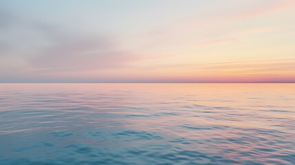 Fototapeta premium Dreamy sunset over a calm ocean with pastel hues