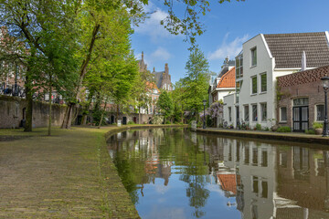 Obraz premium Oudegracht and yard (old canal) with Traditional houses in the city center of Utrecht. Spring time